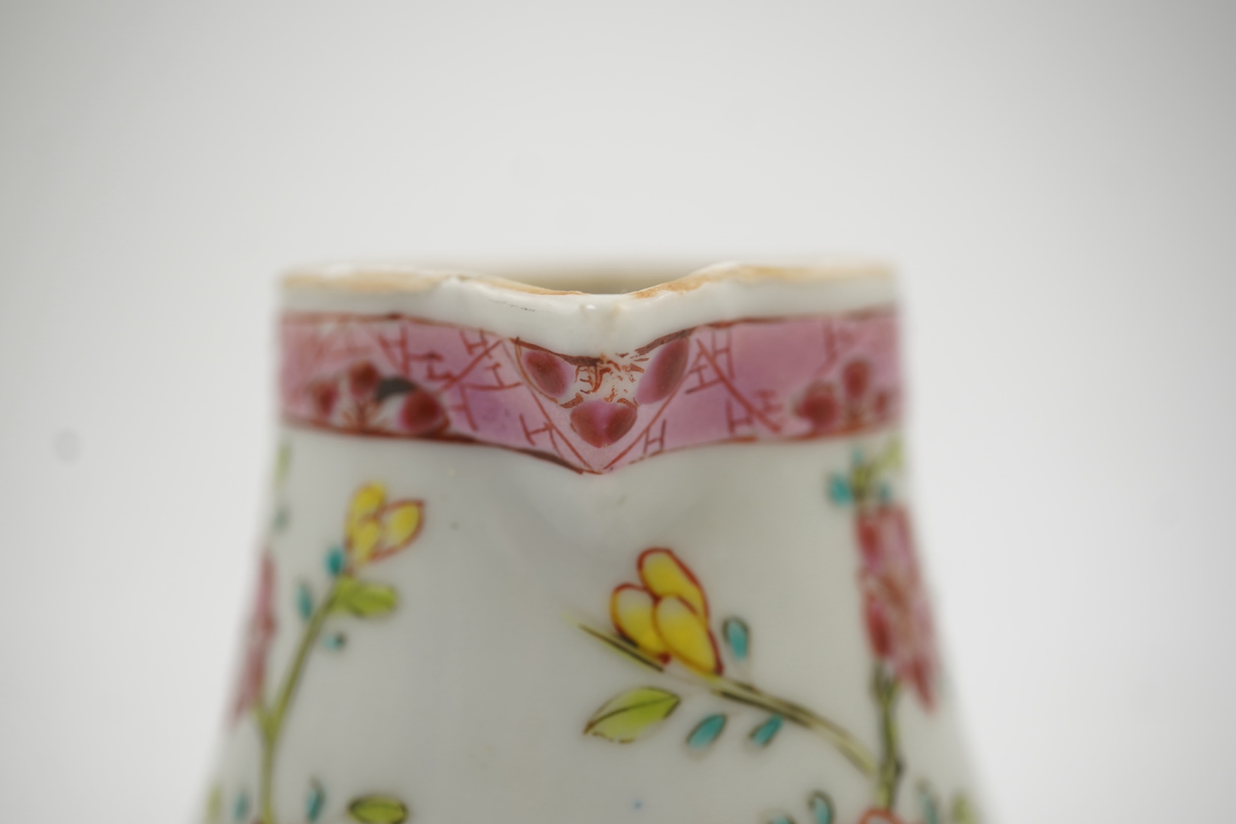 A Chinese famille rose ‘cockerel’ cream jug and cover, Yongzheng period